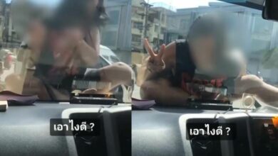สาวสติไม่ดี ปีนหน้ารถ
