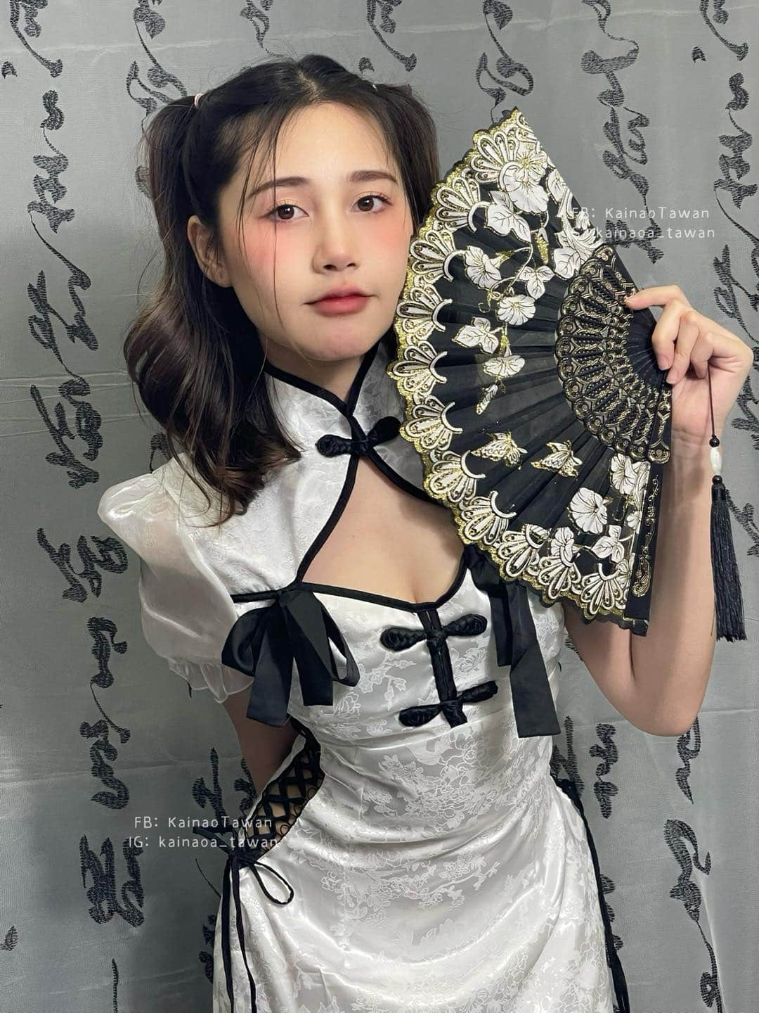 น้องไข่เน่าชุดตรุษจีน สวมกี่เพ้าสีขาว