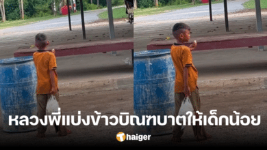monk give food to kids