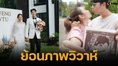 Looking back at wedding photos Khao Tu-Honey Before reporting good news Pregnant with first child Future parents with red signs