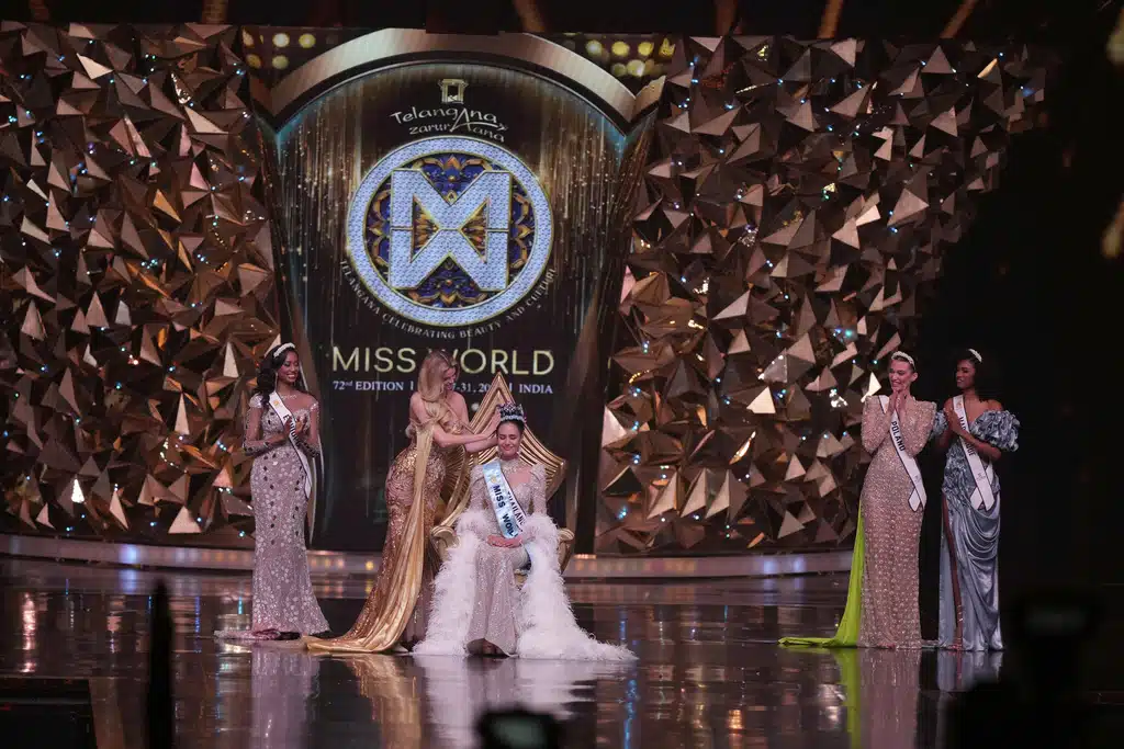 Krystyna Pyszkova of Czech Republic, crowns her successor Opal Suchata of Thailand after she who won the 72nd Miss World pageant in Hyderabad, India, Saturday, May 31, 2025.