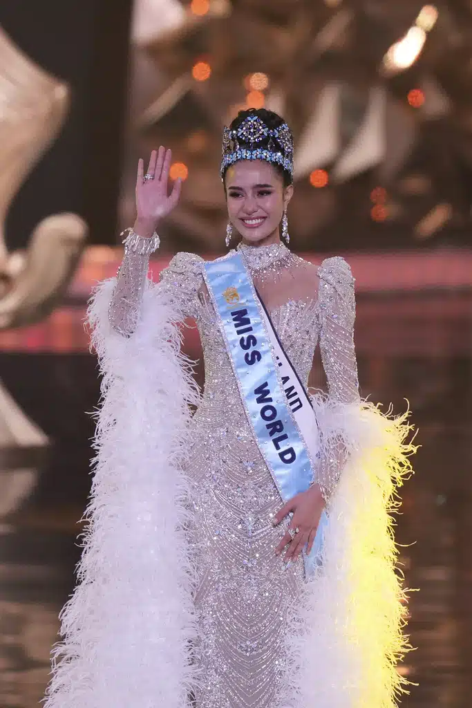 Opal Suchata Chuangsri of Thailand waves after she was crowned Miss World in Hyderabad, India, Saturday, May 31, 2025.