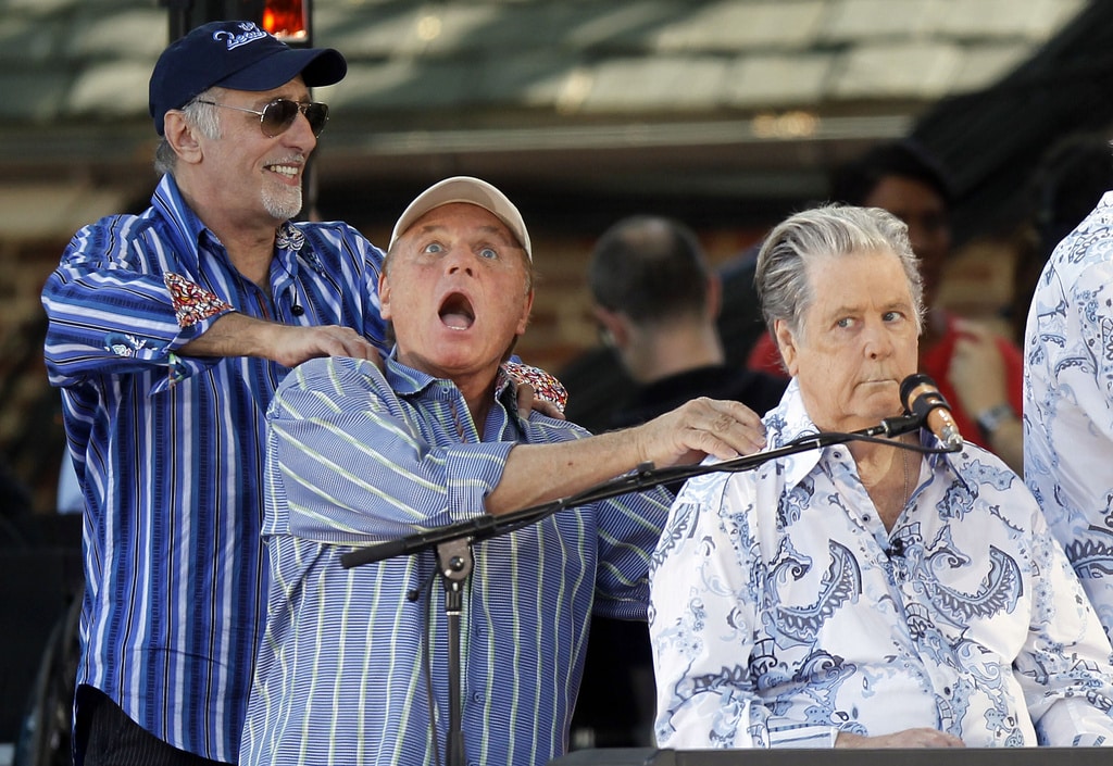 FILE - Original members of The Beach Boys, from left, David Marks, Bruce Johnston and Brian Wilson appear onstage during ABC's "Good Morning America" summer concert series, June 15, 2012, in New York.