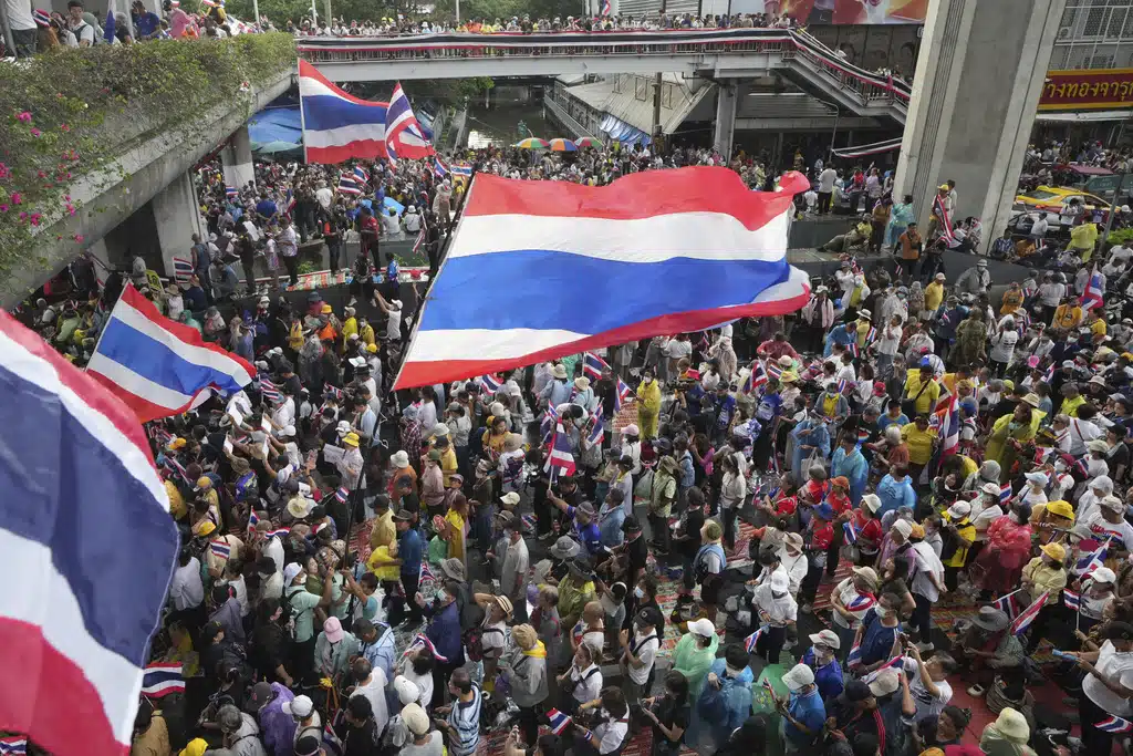 Protesters gather at Victory Monument demanding Thailand's Prime Minister Paetongtarn Shinawatra resign in Bangkok, Thailand, Saturday, June 28, 2025.