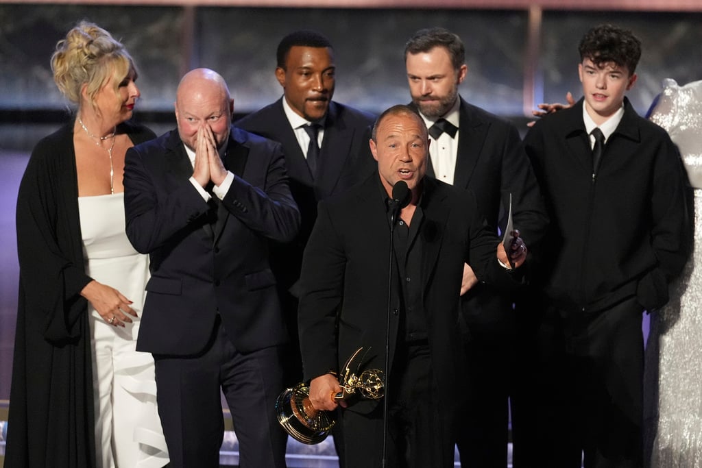 Stephen Graham, center, and the cast and crew of "Adolescence" accept the award for outstanding limited or anthology series during the 77th Primetime Emmy Awards on Sunday, Sept. 14, 2025, at the Peacock Theater in Los Angeles.
