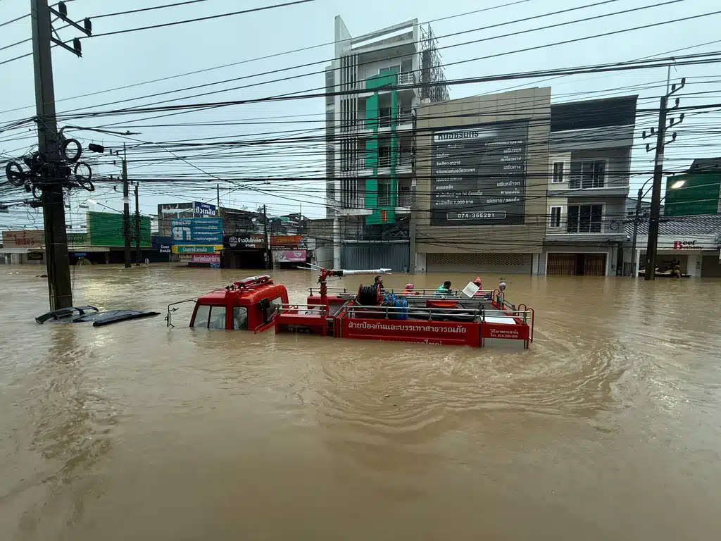 A fire truck is submerged in floodwaters in Songkhla province, southern Thailand, Monday, Nov. 24, 2025.