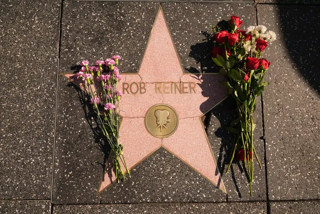 Flowers cover the Walk of Fame star for Rob Reiner Monday, Dec. 15, 2025, in the Hollywood section of Los Angeles.