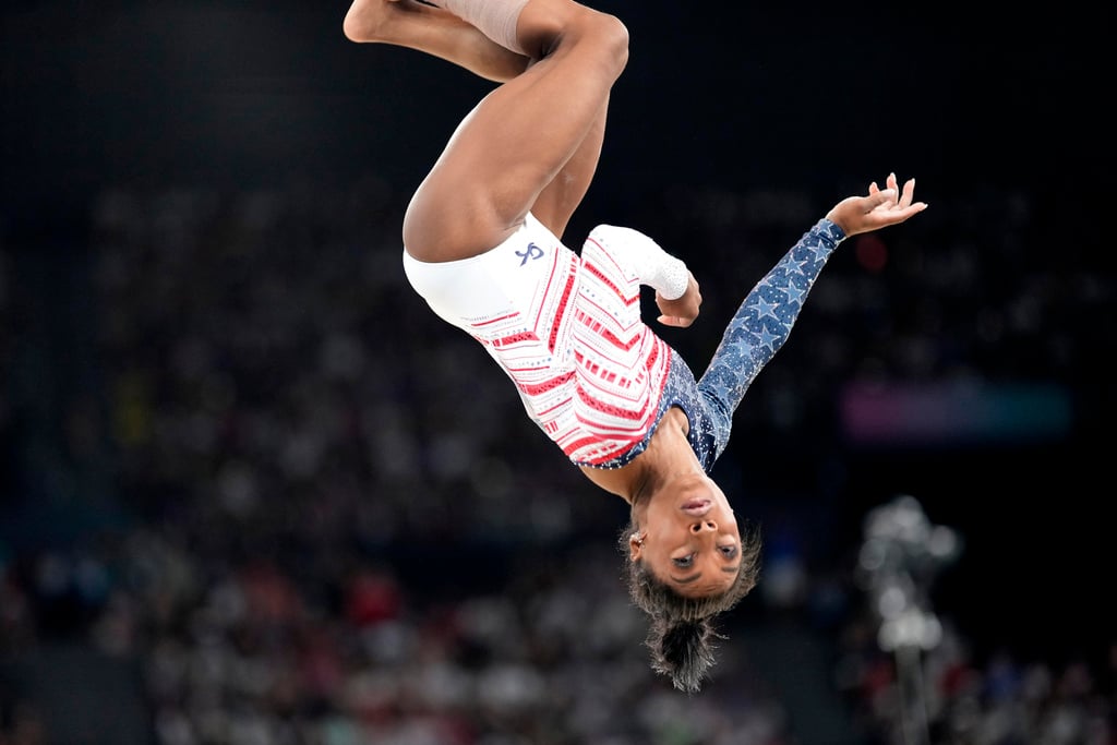 Simone Biles, of the United States, performs on the floor during the women's artistic gymnastics team finals round at Bercy Arena at the 2024 Summer Olympics, Tuesday, July 30, 2024, in Paris, France. 