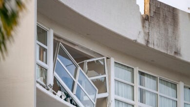 Stolen helicopter crashes into Cairns hotel, injures two