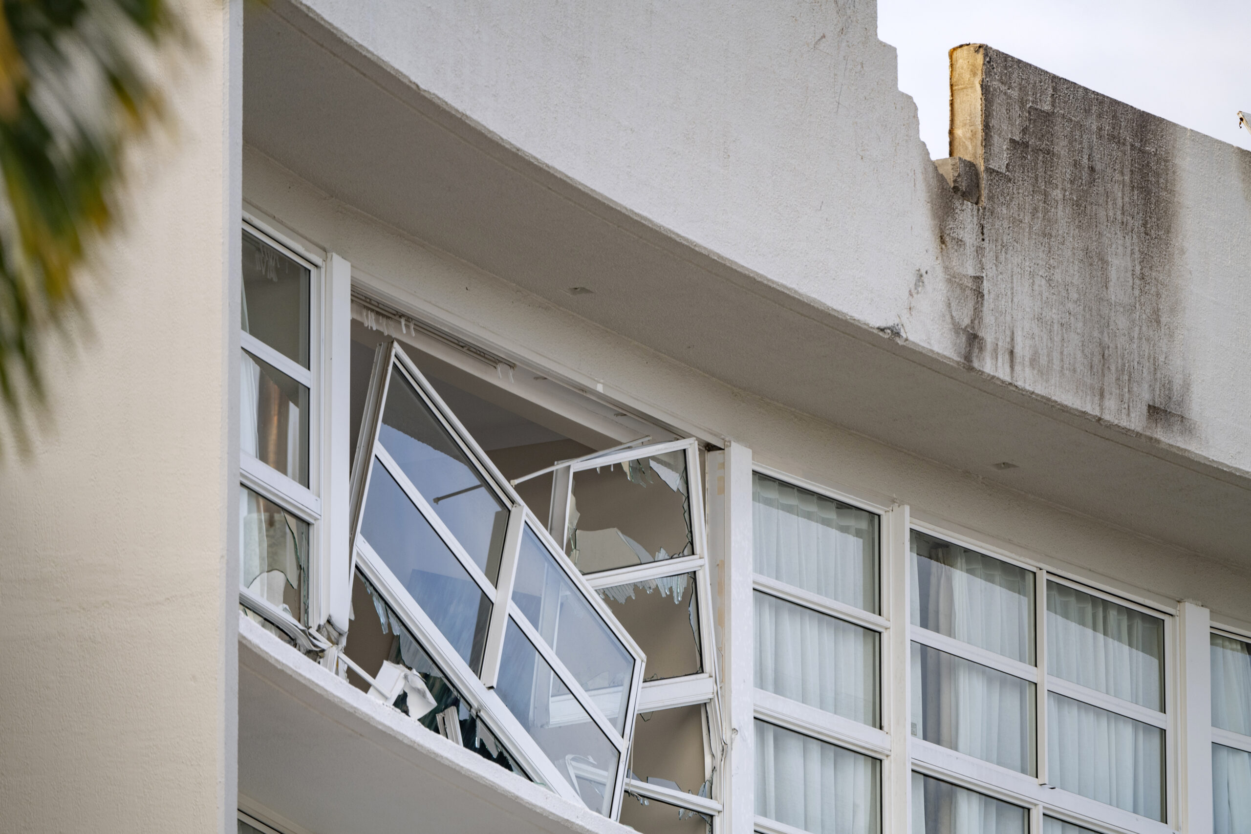 Stolen helicopter crashes into Cairns hotel, injures two