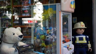 A claw machine stands at a toy store in Rio de Janeiro, Wednesday, Aug. 28, 2024. The Rio police press office said they were carrying out search warrants targeting claw machines because they are considered games of chance and therefore illegal. (AP Photo/Hannah-Kathryn Valles).