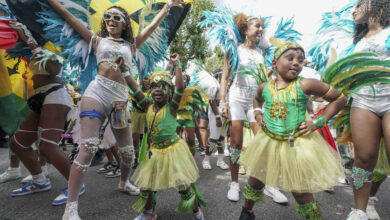 Participants taking part in the Children's Day Parade, part of the Notting Hill Carnival celebration in west London, Sunday, Aug. 25, 2024. (Jeff Moore/PA via AP).