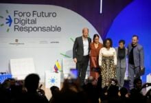 Prince Harry and Meghan pose for photos alongside Colombian Vice President Francia Marquez, center, after speaking at a forum on digital responsibility at EAN University in Bogota, Colombia, Thursday, Aug. 15, 2024. (AP Photo/Ivan Valencia).