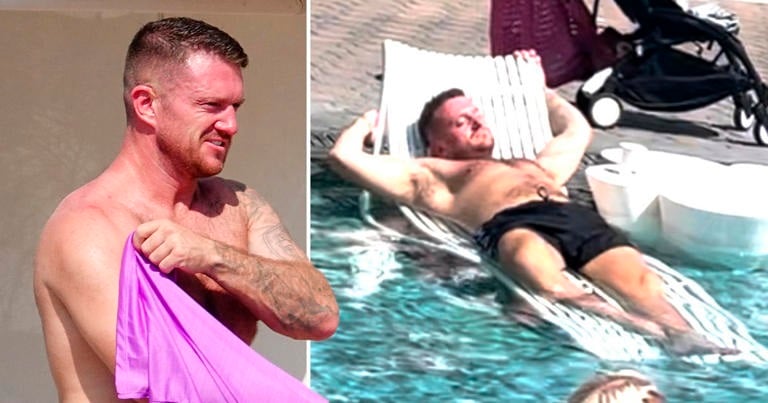 The 41-year-old Robinson was pictured kicking back after fleeing the UK for Cyprus Robinson