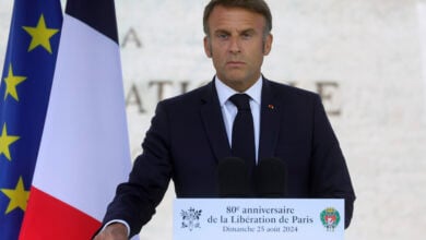 French President Emmanuel Macron delivers a speech during a ceremony commemorating the 80th anniversary of the Liberation of Paris next to the Denfert Rochereau Square in Paris, France, Sunday, Aug. 25, 2024. (Teresa Suarez/ Pool photo via AP).