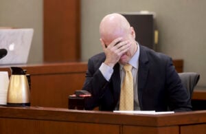 Robert Telles weeps during his narrative on the witness stand during his murder trial at the Regional Justice Center in Las Vegas, Thursday, Aug. 22, 2024. (K.M. Cannon/Las Vegas Review-Journal via AP, Pool).