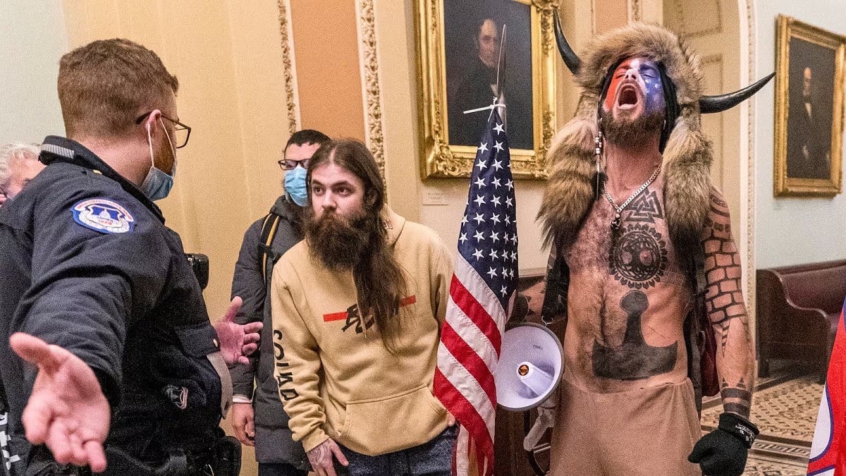 Judge orders return of QAnon Shaman's Capitol riot spear and helmet