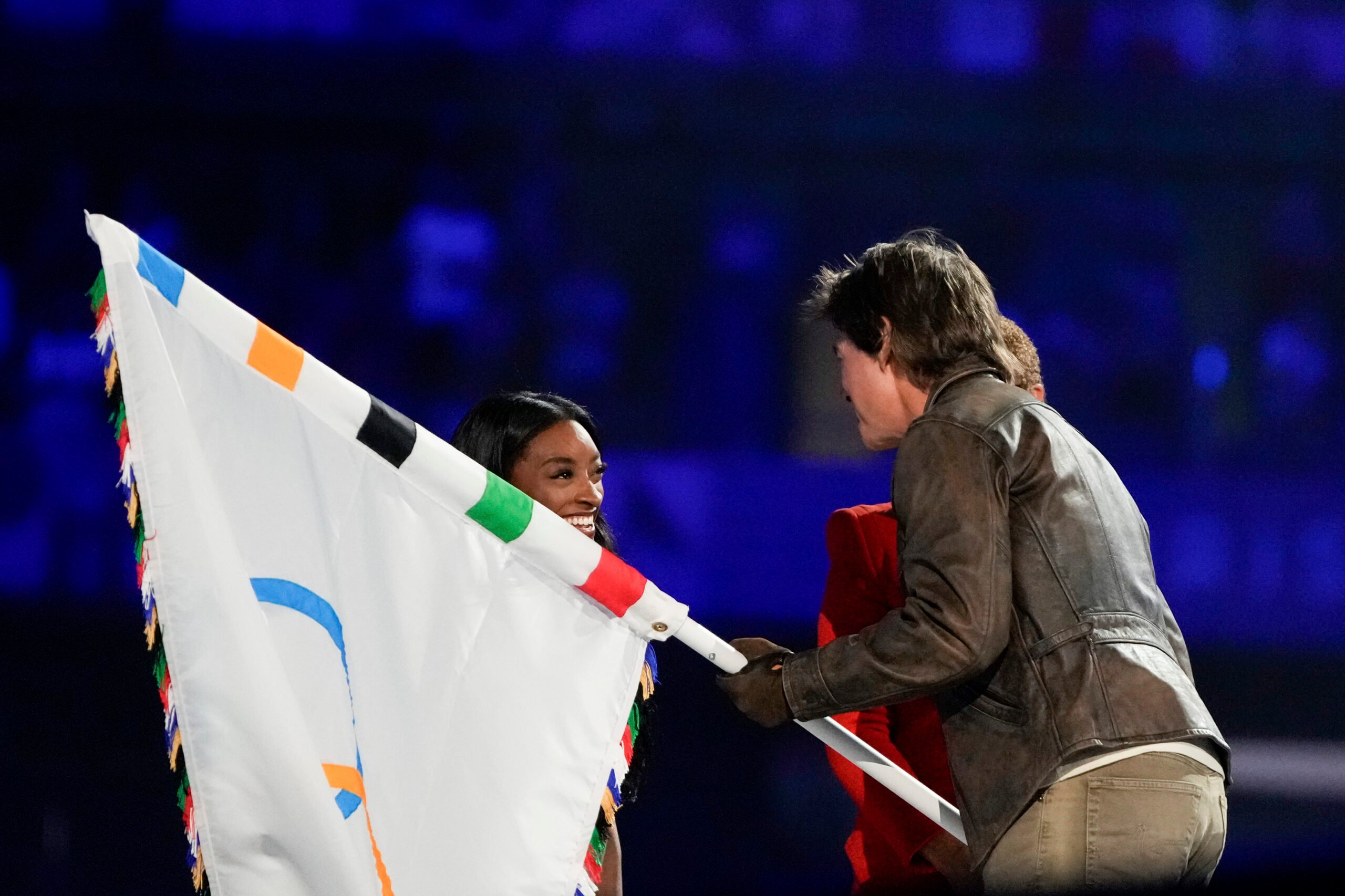 Tom Cruise's daring stunt at Olympics closing ceremony stirs mixed