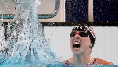 Katie Ledecky, of the United States, celebrates after winning the women's 1500-meter freestyle final at the 2024 Summer Olympics, Wednesday, July 31, 2024, in Nanterre, France.
