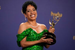 Liza Colon-Zayas poses in the press room with the award for outstanding supporting actress in a comedy series for "The Bear during the 76th Primetime Emmy Awards on Sunday, Sept. 15, 2024, at the Peacock Theater in Los Angeles. (AP Photo/Jae C. Hong).