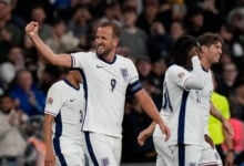 England's Harry Kane, left, celebrates after scoring his side's second goal during the Group F UEFA Nations League soccer match between England and Finland at Wembley Stadium in London, Tuesday, Sept. 10, 2024. (AP Photo/Frank Augstein).