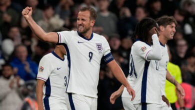 England's Harry Kane, left, celebrates after scoring his side's second goal during the Group F UEFA Nations League soccer match between England and Finland at Wembley Stadium in London, Tuesday, Sept. 10, 2024. (AP Photo/Frank Augstein).