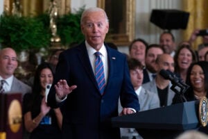 President Joe Biden speaks in the East Room of the White House in Washington, Tuesday, Sept. 10, 2024, during an event to welcome University of Connecticut Huskies Men's Basketball Team to celebrate their 2023-2024 NCAA championship season. (AP Photo/Jose Luis Magana).