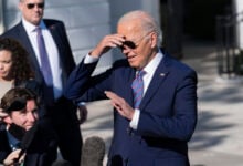 President Joe Biden talks to reporters on the South Lawn of the White House in Washington, Tuesday, Sept. 10, 2024, before departing to New York City. (AP Photo/Jose Luis Magana).