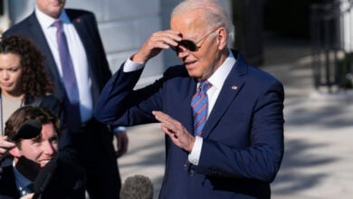 President Joe Biden talks to reporters on the South Lawn of the White House in Washington, Tuesday, Sept. 10, 2024, before departing to New York City. (AP Photo/Jose Luis Magana).