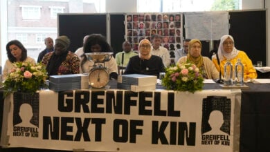 Relatives of the deceased and people directly affected by the Grenfell Tower fire react to the final report into the fire being released in London, Wednesday, Sept. 4, 2024. The report on the fire in which 72 people were killed in June 2017, says decades of failure by government and industry made the high-rise a "death trap". (AP Photo/Frank Augstein).