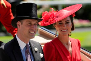 Britain's Prince William and Kate, Princess of Wales arrive for the Royal Ascot horse racing meeting, at Ascot Racecourse in Ascot, England, June 23, 2023. (AP Photo/Alastair Grant, File).