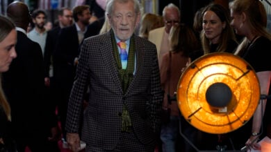 Ian McKellen, walks towards the photographers upon arrival at the European Premiere of the The Critic, In London, Monday, Sept. 2, 2024. (AP Photo/Alberto Pezzali).