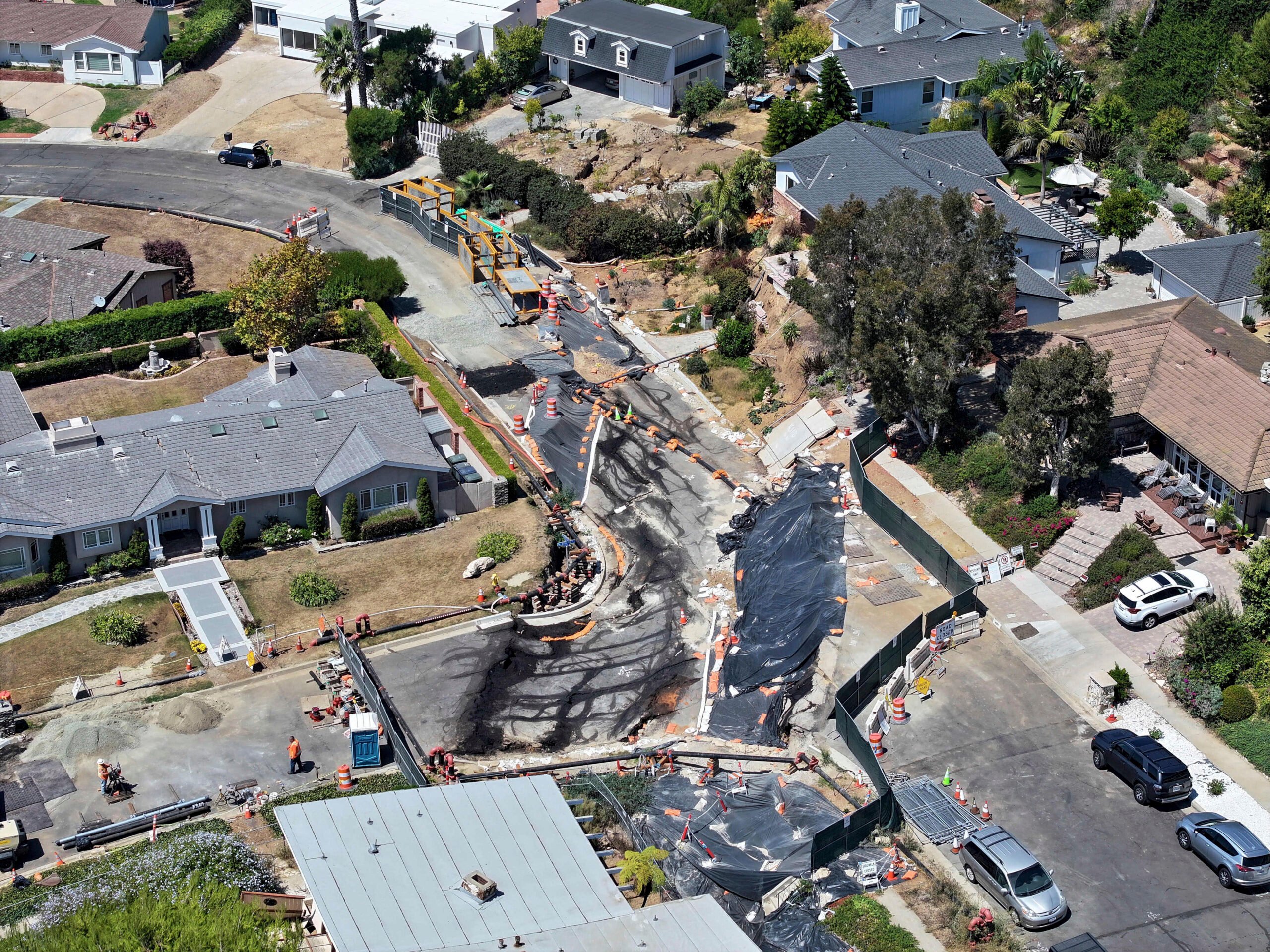 Slide damage on Dauntless Dr. in Rancho Palos Verdes on Tuesday, Sept. 3, 2024. Gov. Gavin Newsom has proclaimed a state of emergency in Rancho Palos Verdes where worsening landslide conditions have led to residents having electrical and gas service cut off. The proclamation is aimed at freeing up state resources to assist in the response to the slides. (Dean Musgrove/The Orange County Register via AP).