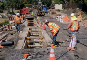 Contractors work to restore services on Exultant Dr. in Rancho Palos Verdes on Tuesday, Sept. 3, 2024. Gov. Gavin Newsom has proclaimed a state of emergency in Rancho Palos Verdes where worsening landslide conditions have led to residents having electrical and gas service cut off. The proclamation is aimed at freeing up state resources to assist in the response to the slides. (Dean Musgrove/The Orange County Register via AP).