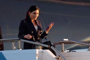 Laura Loomer arrives with Republican presidential nominee former President Donald Trump at Philadelphia International Airport, Tuesday, Sept. 10, 2024, in Philadelphia, for the presidential debate. (AP Photo/Chris Szagola).