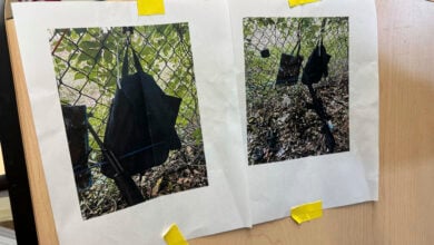 Photos that show an AK-47 rifle, a backpack and a Go-Pro camera on a fence outside Trump International Golf Club taken after an apparent assassination attempt of Republican presidential candidate former President Donald Trump, are displayed during a news conference at the Palm Beach County Main Library, Sunday. Sept. 15, 2024, in West Palm Beach, Fla. (AP Photo/Stephany Matat).