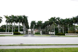 The main entrance of Trump International Golf Club is seen after police closed off the area following the apparent assassination attempt of Republican presidential nominee former President Donald Trump in West Palm Beach, Fla., Sunday, Sept. 15, 2024. (AP Photo/Terry Renna).