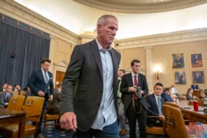 Former NFL quarterback Brett Favre arrives to appear before the House Committee on Ways and Means on Capitol Hill, Tuesday, Sept. 24, 2024, in Washington. (AP Photo/Mark Schiefelbein).