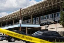 Four fatally shot on Chicago transit train, suspect in custody