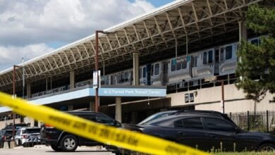 Four fatally shot on Chicago transit train, suspect in custody