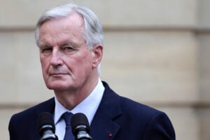 New French prime minister Michel Barnier looks on right during the handover ceremony, Thursday, Sept. 5, 2024 in Paris. President Emmanuel Macron has named EU's Brexit negotiator Michel Barnier as France's new prime minister after more than 50 days of caretaker government. (Stephane de Sakutin/Pool Photo via AP).