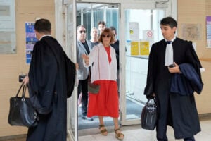 Gisele Pelicot, left, arrives in the Avignon court house, in Avignon, southern France, Thursday, Sept. 5, 2024. (AP Photo/Lewis Joly, File).