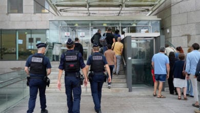 Police officers walk in the Avignon court house prior to the trial of Dominique Pelicot, in Avignon, southern France, Thursday, Sept. 5, 2024. (AP Photo/Lewis Joly, File).