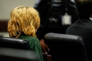 Colt Gray, charged as an adult with four counts of murder, sits in the Barrow County courthouse during his first appearance for the Wednesday shooting at Apalachee High School, Friday, Sept. 6, 2024, in Winder, Ga. (AP Photo/Brynn Anderson, Pool).