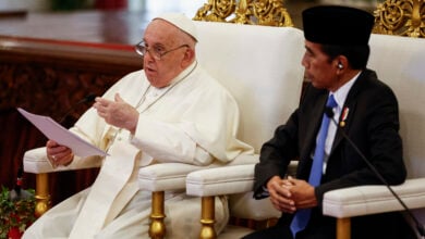 Pope Francis, left, delivers his address as Indonesian President Joko Widodo looks on during a meeting with Indonesian authorities, civil society and the diplomatic corps, during his apostolic visit to Asia, at the Presidential Palace in Jakarta Wednesday, Sept. 4, 2024. (Willy Kurniawan/Pool Photo via AP).