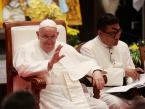 Pope Francis, left, gestures as he speaks during a meeting with beneficiaries from charitable organizations at the Indonesian Bishops' Conference Headquarters in Jakarta Thursday, Sept. 5, 2024. (Adi Weda/Pool Photo via AP).