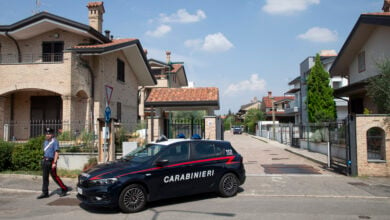 Italian Carabinieri patrol outside the house where a 17-year-old boy killed his brother and parents in Paderno Dugnano near Milan, northern Italy, Sunday, Sept. 1, 2024. Italian prosecutors on Monday said a 17-year-old high school student who confessed to stabbing to death his 12-year-old brother and parents had been suffering a general sense of “malaise,” but has been unable to provide a motive for a triple homicide that has shocked Italians. (Marco Ottico/Lapresse via AP).