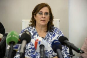 Juvenile prosecutor Sabrina DItaranto speaks at a press conference about a 17-year-old high school student who confessed to stabbing to death his 12-year-old brother and parents, Monday, Sept. 2, 2024, in Milan. (Claudio Furlan/LaPresse via AP).