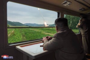 In this undated photo provided on Friday, Sept. 13, 2024, by the North Korean government, its leader Kim Jong Un, center right, inspects what they say is test-firing from their new launch vehicle of 600mm multiple rockets at an undisclosed location in North Korea. Independent journalists were not given access to cover the event depicted in this image distributed by the North Korean government. The content of this image is as provided and cannot be independently verified. Korean language watermark on image as provided by source reads: "KCNA" which is the abbreviation for Korean Central News Agency. (Korean Central News Agency/Korea News Service via AP).