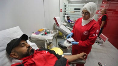 People donate blood for those who were injured by their exploded handheld pagers, at a Red Cross center, in the southern port city of Sidon, Lebanon, Tuesday, Sept. 17, 2024. (AP Photo/Mohammed Zaatari).